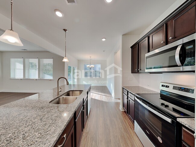 Building Photo - 7062 Creeksong Dr