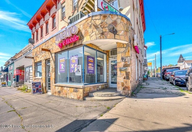 Building Photo - 104-104 S Main Ave
