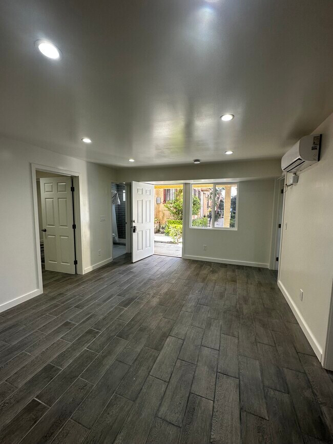 LIVING ROOM - 957 W 45th St Apartments