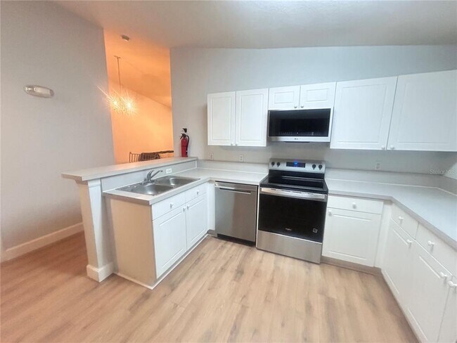 Building Photo - 8825 Grand Palms Cir
