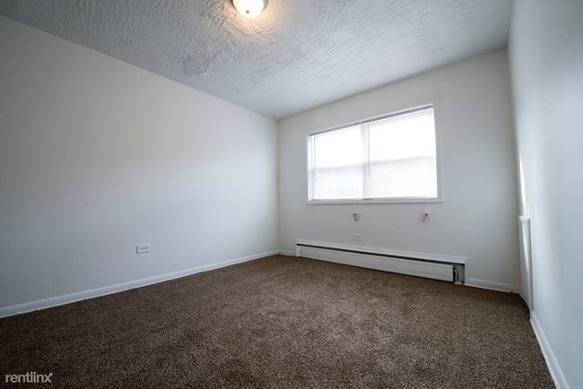 Building Photo - 1 br, 1 bath Apartment - 5019 W Jackson Blvd