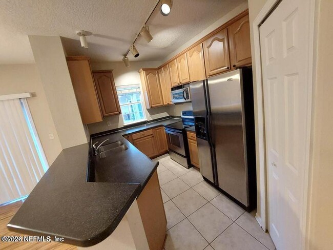 Building Photo - 7151 Deerfoot Cir
