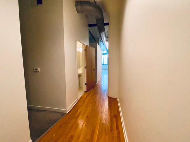 View of bedroom and half bath - 1224 W Van Buren St