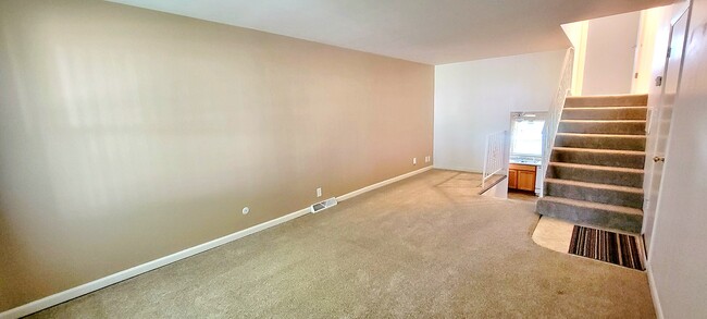 Living room and nook * - 5205 N Montclair Ave