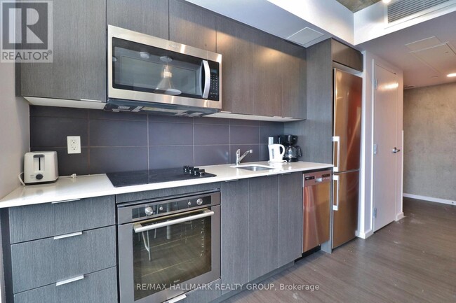 Photo du bâtiment - 105-1105 Champagne Ave S