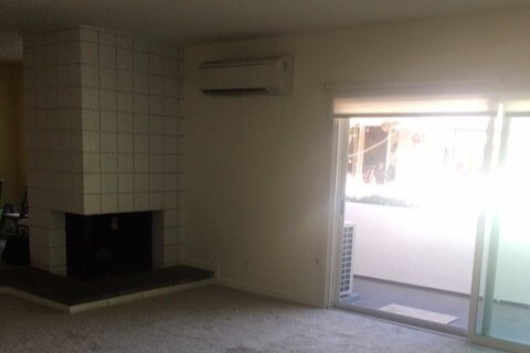 Living Room with A/C unit (view from hallway) - 1255 Baker St