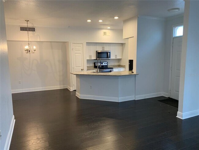 Building Photo - 9324 Lake Chase Island Way