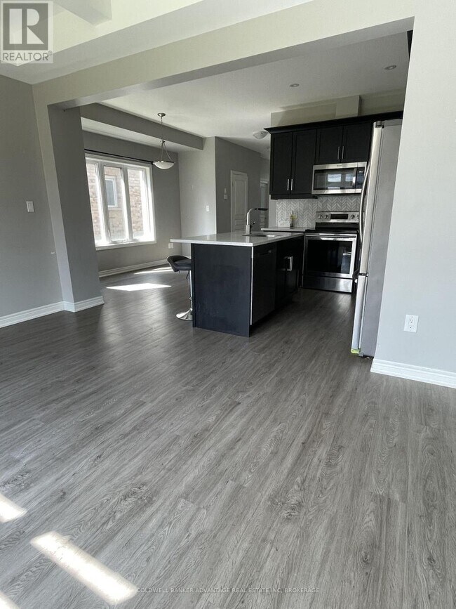 Photo du bâtiment - 9577 Tallgrass Ave
