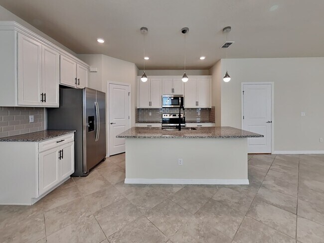 Foto del edificio - 5634 Wooden Pine Dr