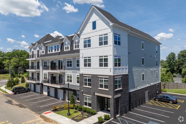 Optional one car garages Heated - Sylvan Woods Howell