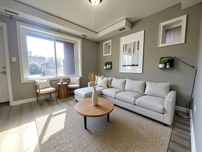 Building Photo - Private Balcony and HUGE windows at this 1...