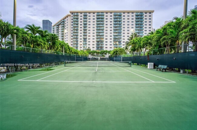 Building Photo - 19380 Collins Ave