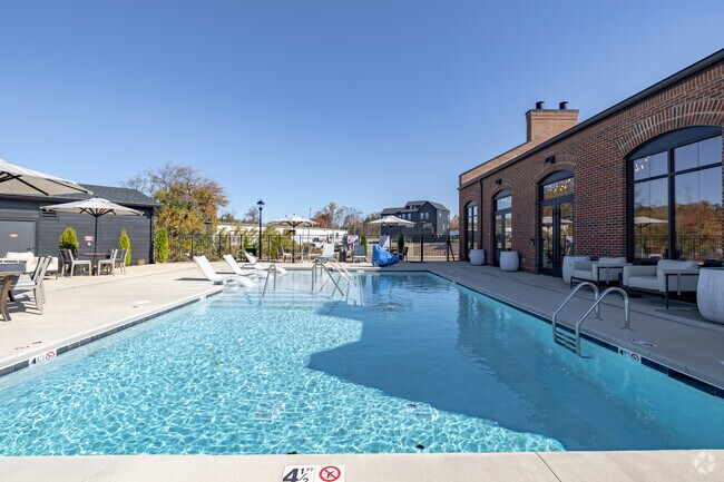 Piscina estilo resort - Sablewood