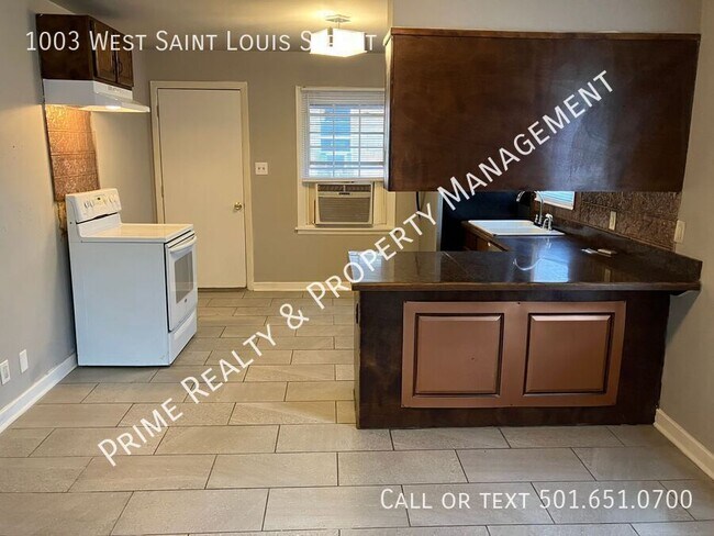 Foto del edificio - 1003 W St Louis St