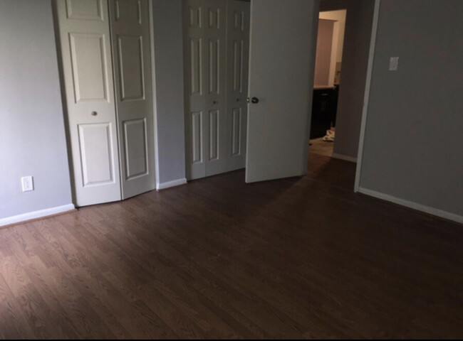 Large bedroom with multiple closets - 10103 Prince Pl