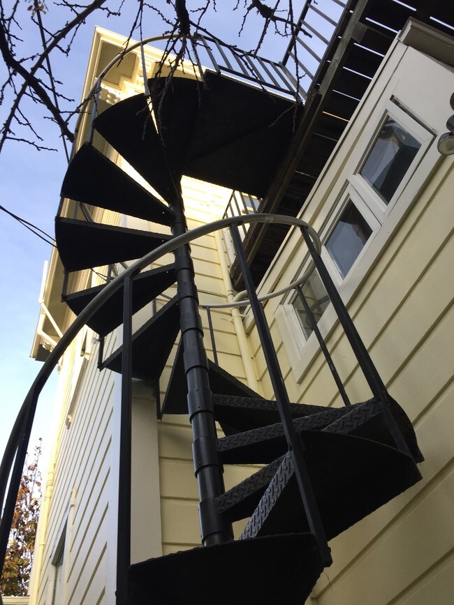 Spiral staircase takes you into the apartment - 1561 8th St