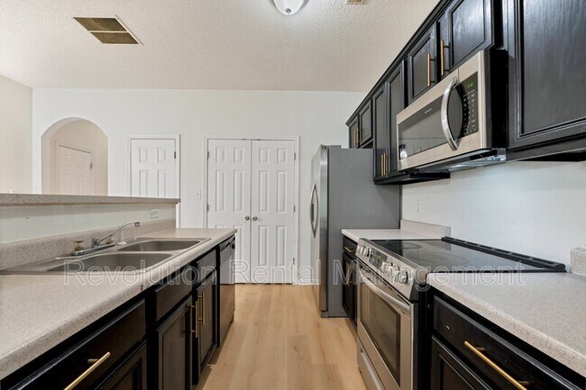 Building Photo - 8520 Kaden Dr
