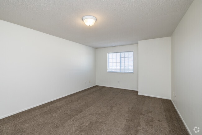 3BR, 2.5BA - 1,660SF - Primary Bedroom - The Brittany's Apartments and Townhomes