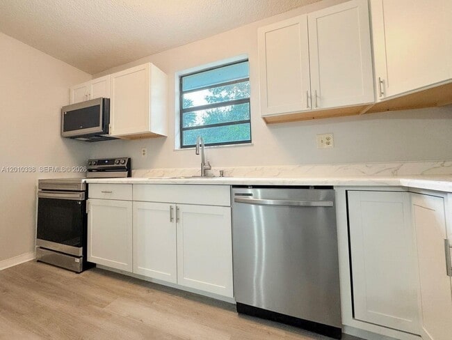 Building Photo - 10947 NW 45th St