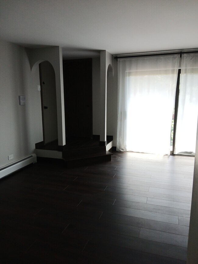 Front entry with coat closet and new sliding door to balcony - 15820 Orlan Brook Dr