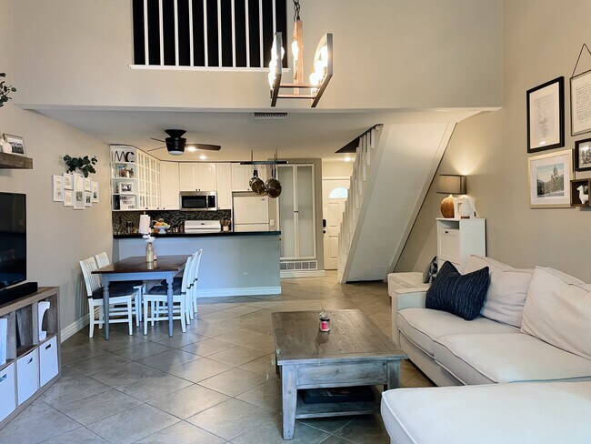 Vaulted ceilings really open up the space - 4900 E Chapman Ave