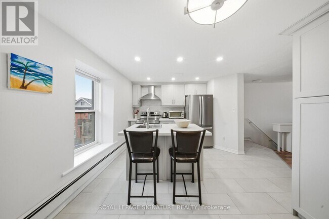 Photo du bâtiment - 209 Hunter St E