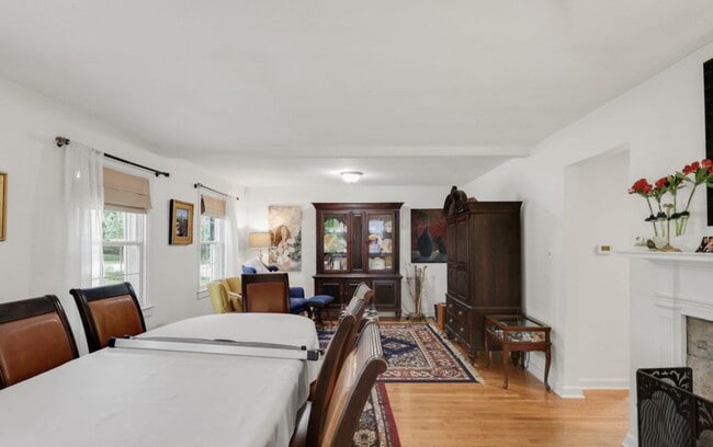 Photo - "Charming 2-Bedroom Duplex with Cozy Firep... Apartment