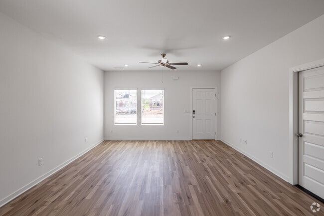 3BR, 2.5BA - 1,528SF - Living Room - Flyway Meadows