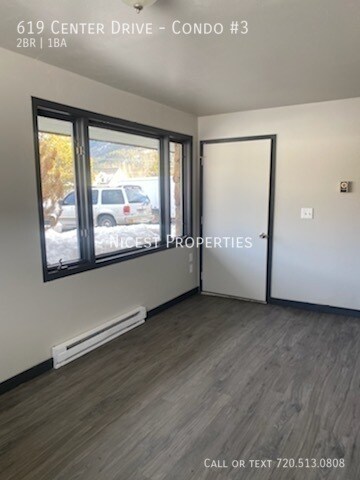 Building Photo - 2bd/1bth condo for rent in Grand Lake w/ p...