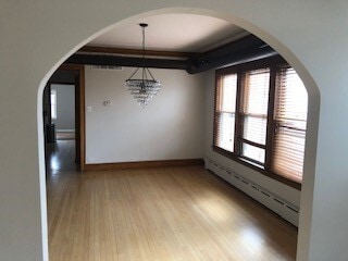 Building Photo - 5855 N Melvina Ave