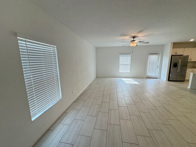 Building Photo - Spacious 5-Bedroom Home with Community Poo...