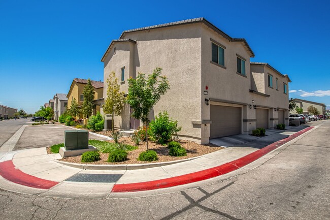 Building Photo - Beautiful corner lot townhome with custom paint, plentiful community green spaces.