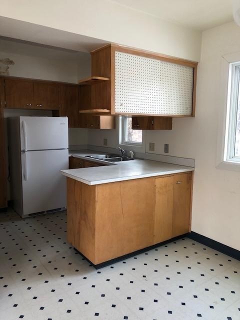 Building Photo - 115 11th Ave NW #B