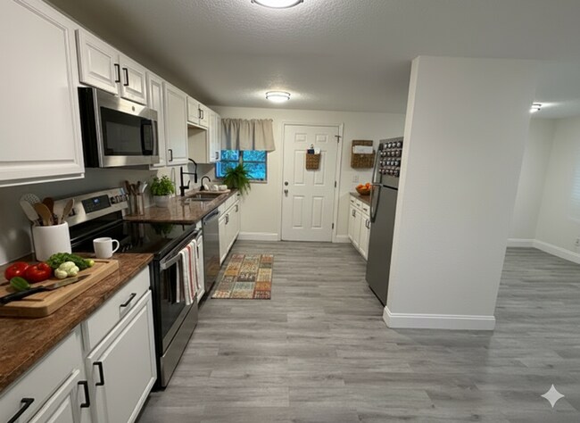 Photo - Gorgeous, Fully Renovated 4 Bedroom Winter Park Home with 2 additional rooms that can be used as ...