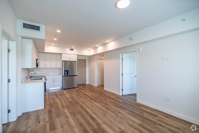 2BR, 2BA - 910SF - Living Room/Kitchen - Adrian Builders at Eureka