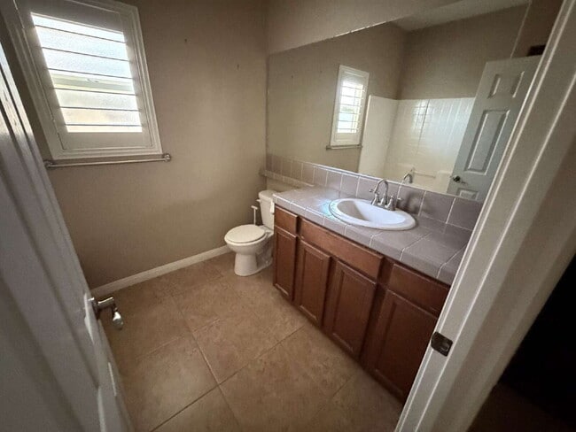 Building Photo - 3 Bedroom, 2 Bathroom Home with Spacious Open Floor Plan & RV Parking