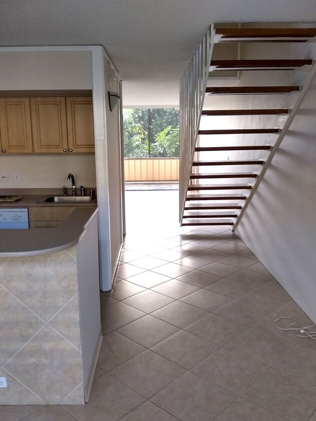 View from kitchen through living room to lana - 3030 Pualei Cir