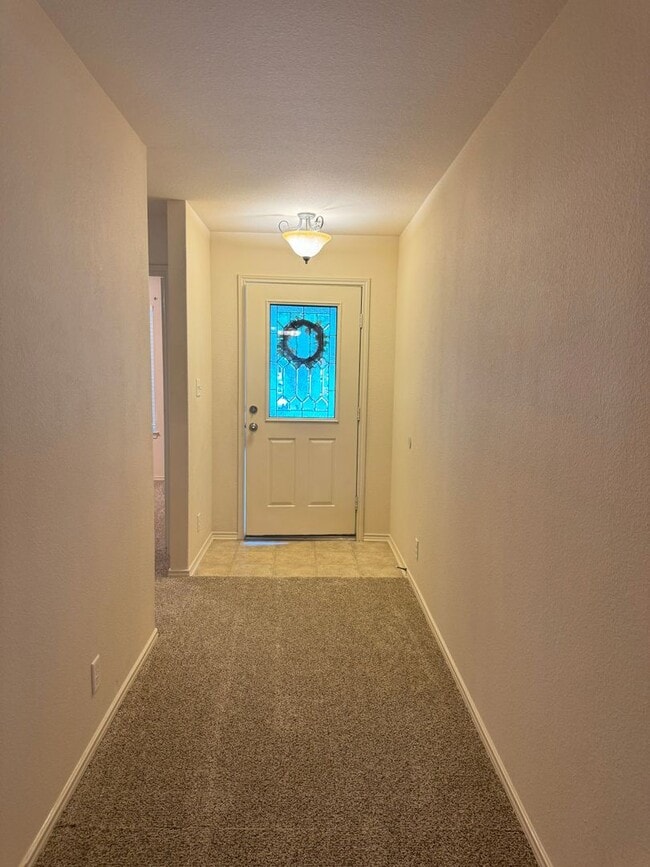 Building Photo - Welcome home to 10115 Red Iron Creek!