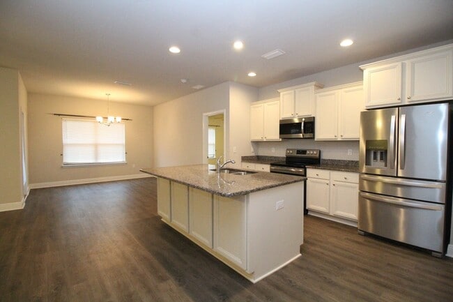 Building Photo - Pace 3/2 Home with Open Layout & Fenced Ya...