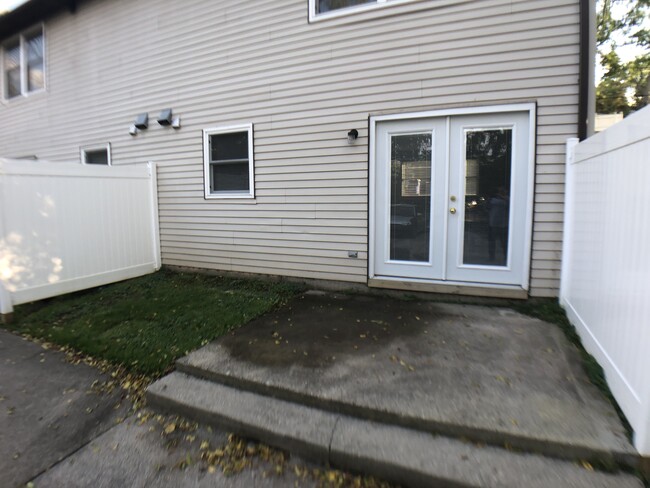 Rear Patio with privacy screens - 500 Cedar St NE