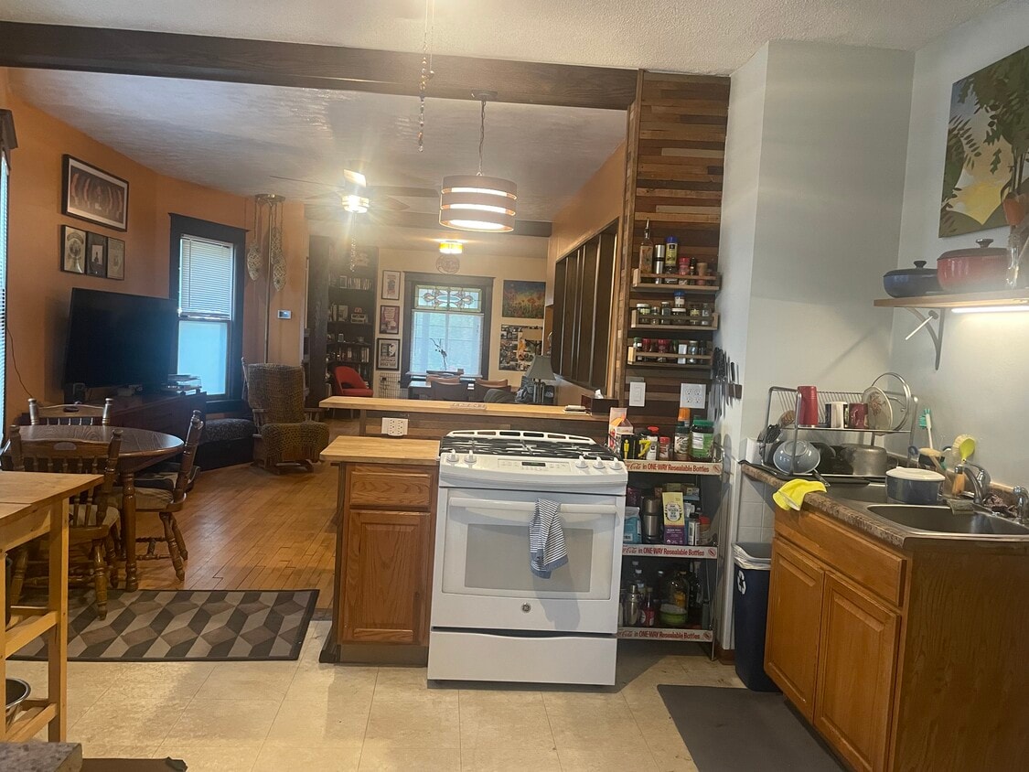 Kitchen is open to living and dining room space. - 2320 Monroe St NE