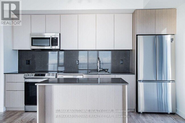 Photo du bâtiment - 125-A1125 Bronte Rd