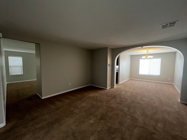 Building Photo - Welcome to this stunning 3-story home loca...
