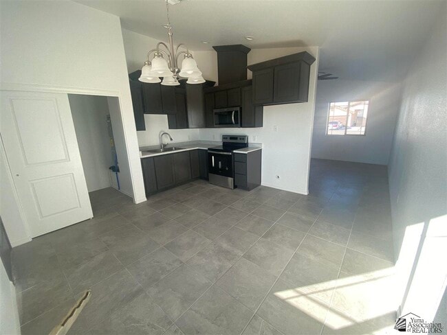 Building Photo - 4655 E Los Olivos Dr