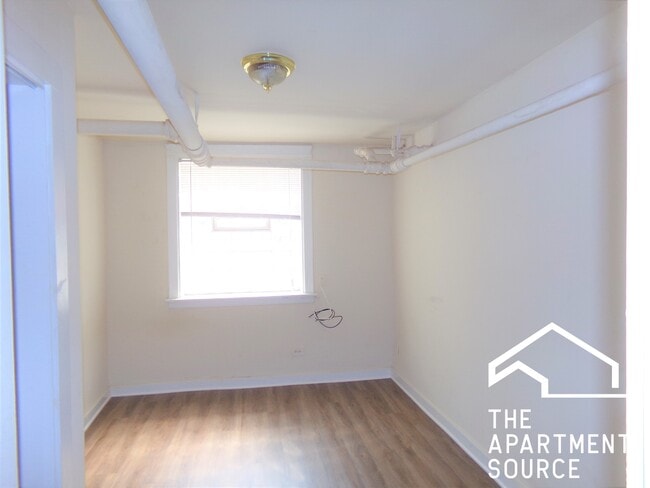 Building Photo - 6574 N Lakewood Ave