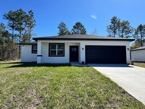 Building Photo - 7185 N Tallwood Dr