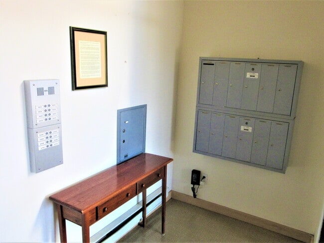 front entry foyer with intercom & mailboxes - The Hickory