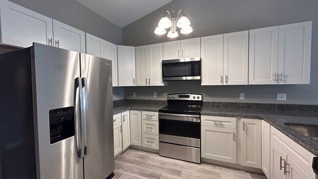 Foto del edificio - 4 Bedroom Townhome