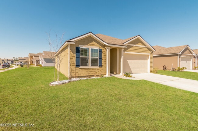 Building Photo - 15697 Saddled Charger Dr