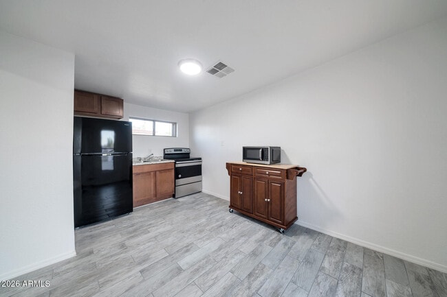 Building Photo - 1108 S 33rd Ave